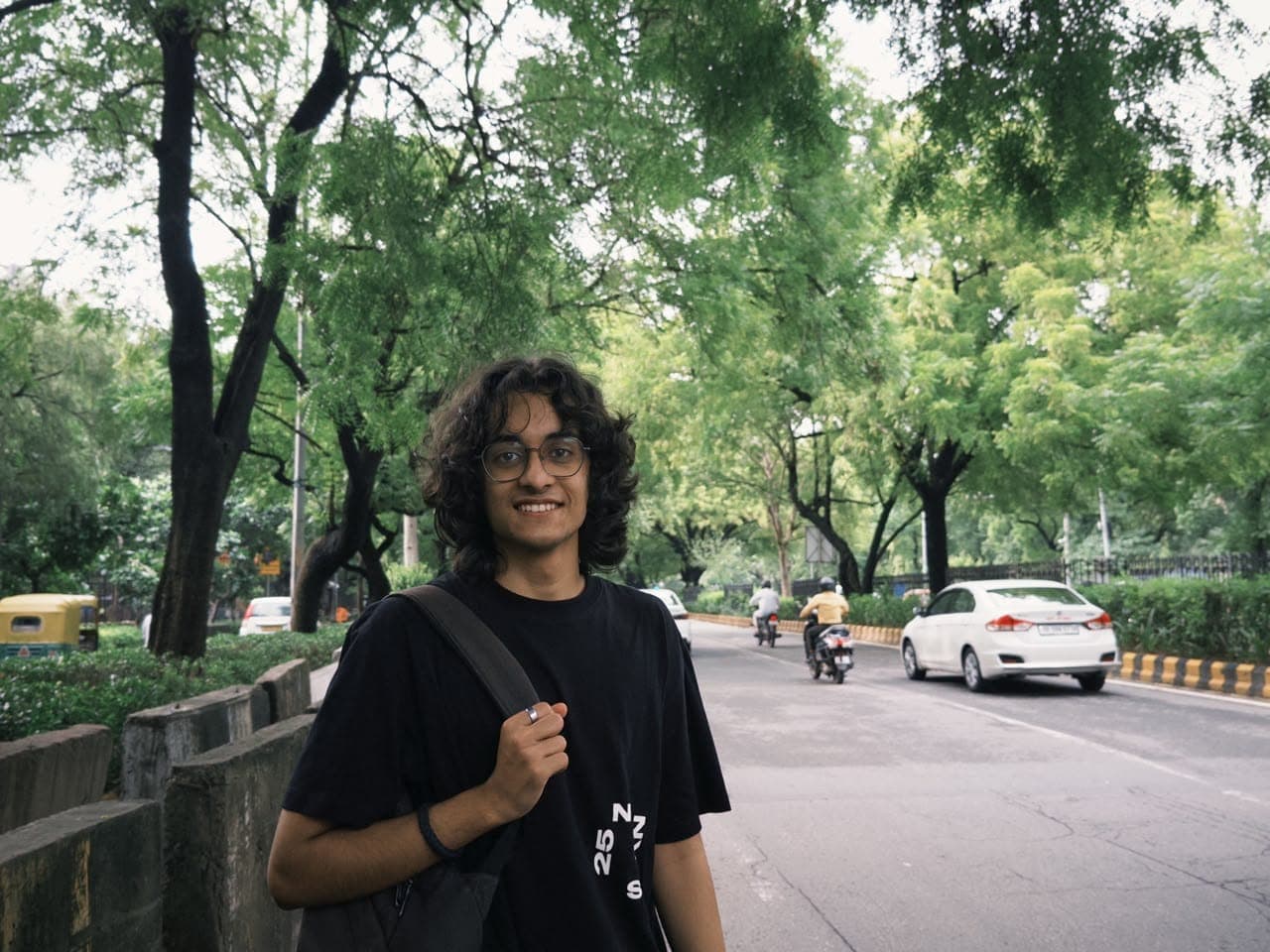 Shreyas Mahajan on a tree-lined street